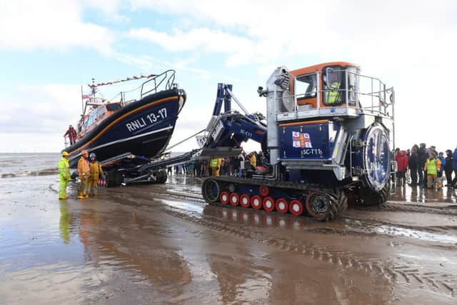 RNLI volunteers operate the new recovery system for the Shannon class lifeboat. Photo: MSKP-280117-13 ANL-170130-112641001