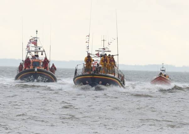 The new Skegness Lifeboat, the Joel and April Grunnill, arrives at Skegness accompanied by the Lincolnshire Poacher and the inshore lifeboat. ANL-170130-112317001