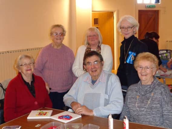 Louth's dementia cafe received a surprise visit from the High Sheriff of Lincolnshire.
