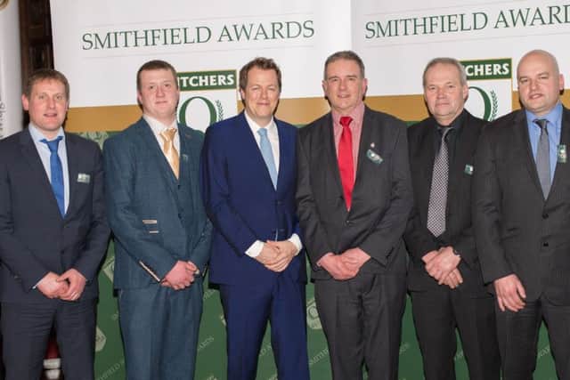 Heckington butcher Gary Simpson (left) with Tom Parker-Bowles (centre). EMN-170602-181451001