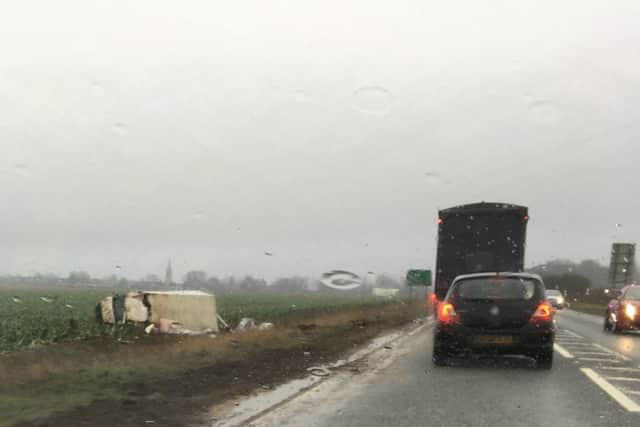 The crashed lorry, off the road in a field at Kirkby La Thorpe. Photo by Mark Dalton. EMN-170702-092730001