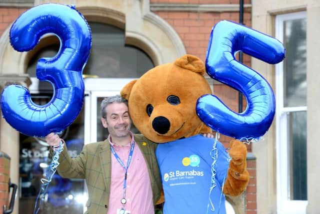St Barnabas Chief Executive, Chris Wheway and Hospice mascot Barnabas Bear