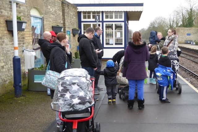 Stranded yet again: At least a dozen rail passengers are left on the platform after being unable to board EMN-170220-134319001
