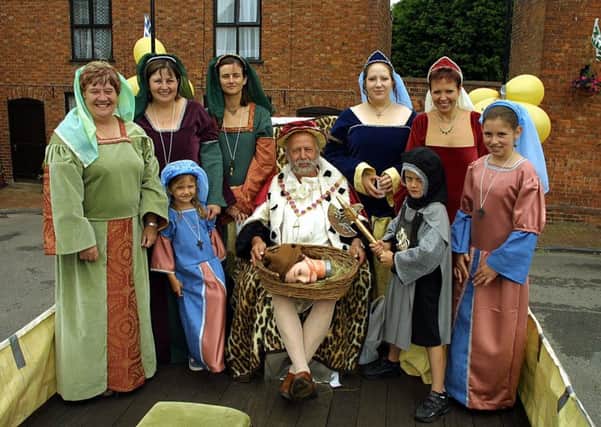 AC Burgh FC depicting Henry VIII (Robert Barlow) and five of his wives at Burgh Carnival in 2004.