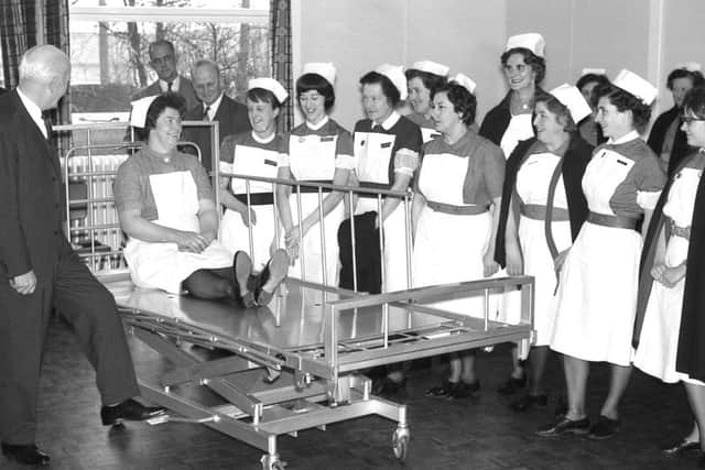 A demonstration of a height adjustable bed at Boston General Hospital in 1967. The bed had been made to a specification and design resulting from a study conducted by Kings Edward Fund for London in collaboration with the Arts Council.