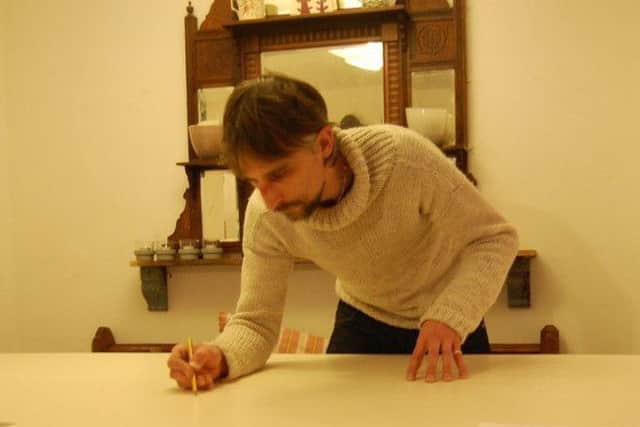 Wood Enderby artist Christopher Wiles at work EMN-171002-065343001