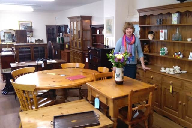Heather Johnson and her new furniture business, Home-Feather & Stone. EMN-171002-154802001