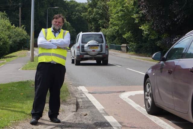 Coun Stephen Bunney wants people to help show the state of the roads. EMN-171002-160026001