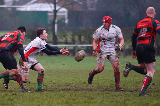Dan Robinson, who collected eight of Rasens points, finds Christian Mills EMN-170213-125952002