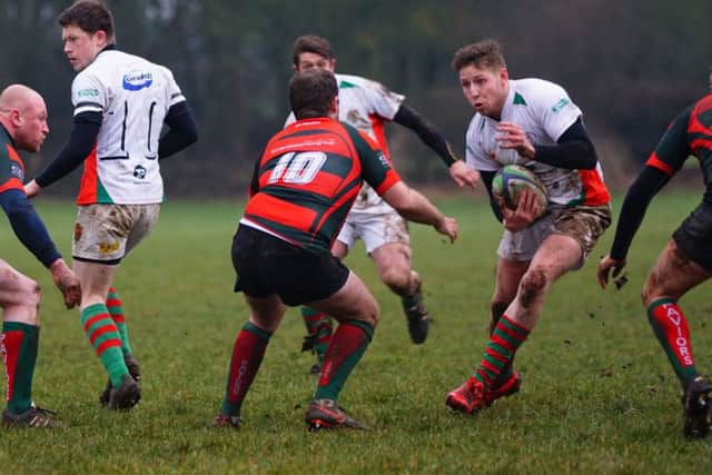 Tom Stephens spots a gap in the resolute Paviors rearguard EMN-170213-130004002
