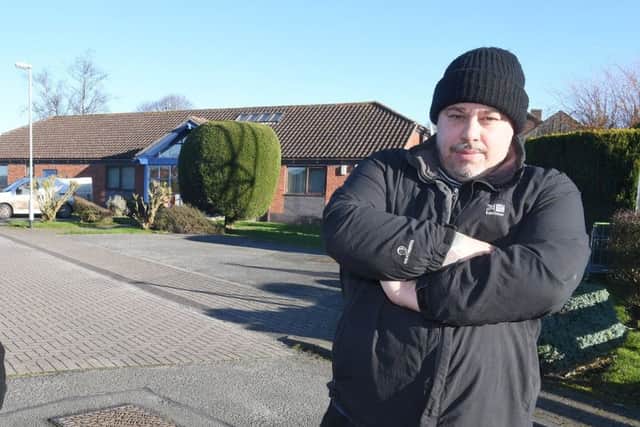 Paul Dudley of Wainfleet, with son Liam Dudley 13, pictured outside outside Wainfleet Surgery. Photo: MSKP-140117-25 ANL-170213-153018001