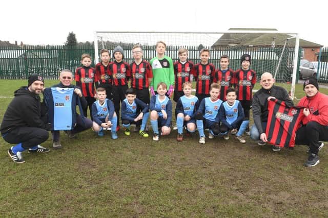 Boston JFC U11's team with new kit, players pictured with L-R Dean Stevens - manager, Andy Willis - sponsor (Clean143), Dale Sharman - sponsor (d signs), David Willis - manager.