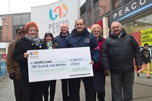 A cheque for £1,100 has been presented to Boston Lions from Pescod Square.