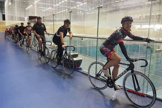 Tri3 Sleaford Triathlon Club members prepare for a spin around Derby Velodrome EMN-170216-095834002