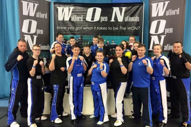 Pictured are the Evolution fighters: (back row, from left) - Talon Chambers, Mackenzie Warrant, Leilo Tate, Riley Brocklesby, Kyle Green, Paige Stedman, Olivia Green and Tegan Aldis; front - Lee Brocklesby, Rhys Coleman, Toni Hunter, Zac Baldry, Chelsea Leggatt, Tammy Horton, John Chambers, Nesta Baxter and Mark Baldry.