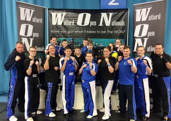 Pictured are the Evolution fighters: (back row, from left) - Talon Chambers, Mackenzie Warrant, Leilo Tate, Riley Brocklesby, Kyle Green, Paige Stedman, Olivia Green and Tegan Aldis; front - Lee Brocklesby, Rhys Coleman, Toni Hunter, Zac Baldry, Chelsea Leggatt, Tammy Horton, John Chambers, Nesta Baxter and Mark Baldry.