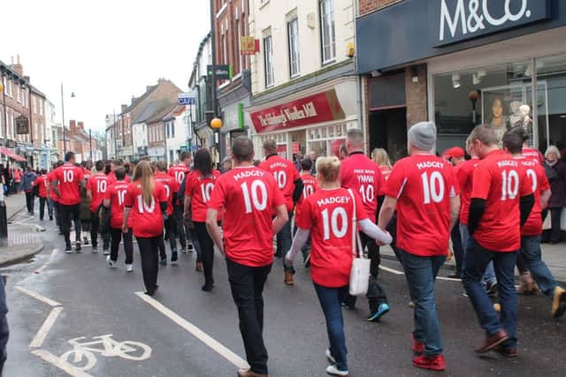 Procession in tribute to Richard Madge on Thursday, ahead of his funeral later that day.