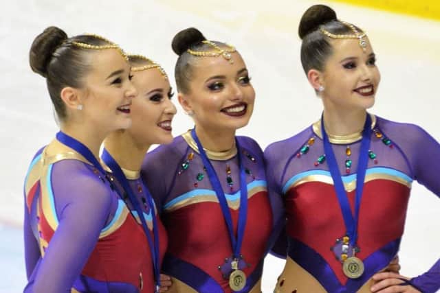 Fiona (right) with part of the championship-winning Icicles team EMN-170216-164625002