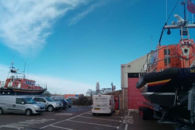 The new Joel April Grunnill Shannon class lifeboat (right) with the Lincolnshire Poacher outside Skegness Lifeboat Station. ANL-170216-142759001