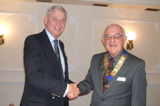 Bob Aspinall handed over the chain of office to Richard Mason. EMN-170226-155145001