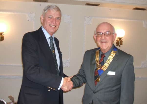 Bob Aspinall handed over the chain of office to Richard Mason. EMN-170226-155145001