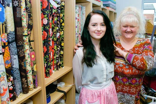 Amber Snary is wearing an apron similar to the one sent to Helen Flanagan by Diane Wainwright (right). EMN-170227-092642001