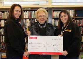 Rachel Hay, left, and community fundraiser Faye Nam, right. with Ros Bell