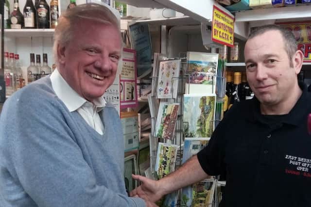 Sir Edward Leigh with Sub-Postmaster David Ward on his visit to East Barkwith Post Office EMN-170221-085451001