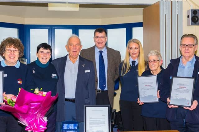 The RNLI Mablethorpe shop volunteers receiving their certificates.