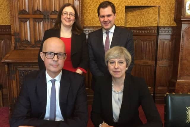 Sleaford and North Hykeham MP Dr Caroline Johnson (back left) with MP for Newark Robert Jenrick (back right), MP for Grantham and Stamford Nick Boles (front) and Prime Minister Theresa May. EMN-170222-164220001