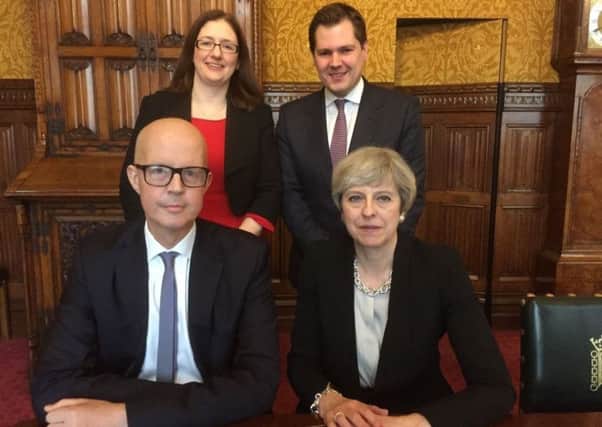Sleaford and North Hykeham MP Dr Caroline Johnson (back left) with MP for Newark Robert Jenrick (back right), MP for Grantham and Stamford Nick Boles (front) and Prime Minister Theresa May. EMN-170222-164220001