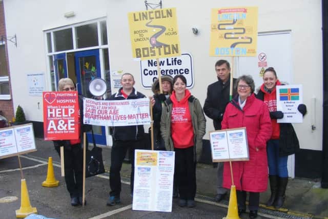 Protestors from Fighting for Grantham Hospital and SOS Pilgrim Hospital ) with chairman of the county Health Scrutiny Committee, Coun Christine Talbot who attended the meeting (2nd from right). From left Bernice Cullimore, Ian Brothwell, Alison Marriott, Sarah Stock, Phillip Bosworth and Melissa Darcy. EMN-170125-104823001