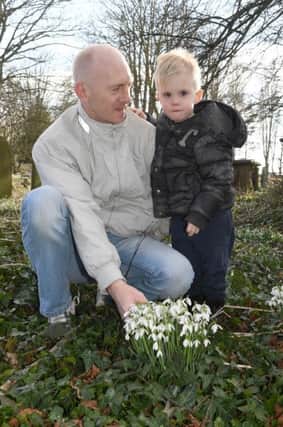Skirbeck Snowdrop Sunday at Skirbeck St Nicholas' Church. Sonny Spicer of Boston with his son Vinnie Spicer 3.