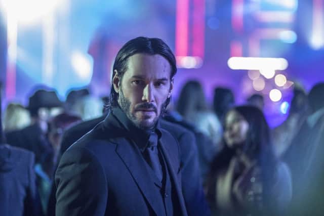 Keanu Reeves as John Wick.