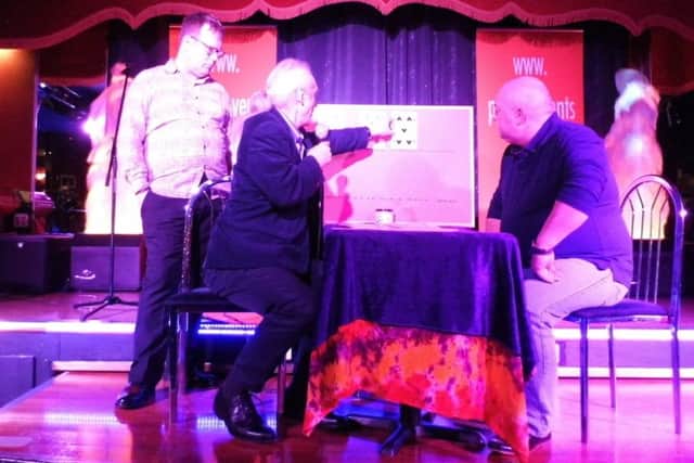 Clemens Brenan psychic tarot at a demonstration earlier this year. EMN-170103-161047001