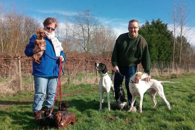 Yvonne Kent holding Tina, with Jeeves, Puff, Irene and India, and Royston Walkling with Jack, Renee and Flavio EMN-170103-141747001