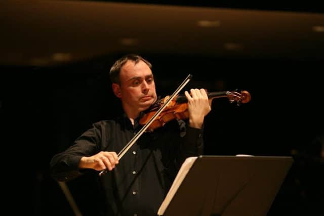 Principal Violinist Ben Holland.