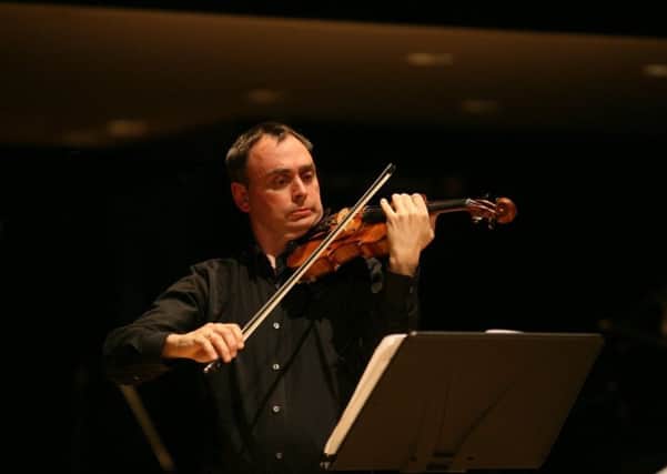 Principal Violinist Ben Holland.