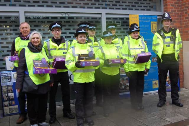 St Botolph Rotary Club members joined by police cadets. EMN-170603-144302001