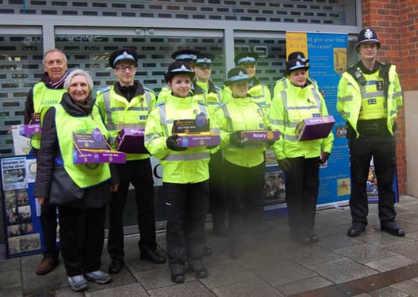 St Botolph Rotary Club members joined by police cadets. EMN-170603-144302001