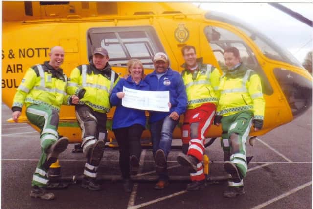 Tina and Steve Grant-Brown with the Lincs & Notts Air Ambulance team.