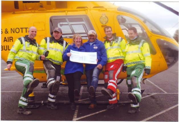 Tina and Steve Grant-Brown with the Lincs & Notts Air Ambulance team.