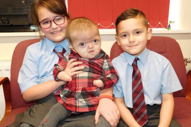 Bethany, Penny and Levi Barratt. EMN-170303-161722001