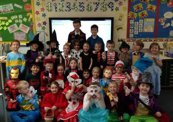 Year one pupils at St Botolph's School with two Carre's pupils dressed up for World Book Day activities. EMN-170603-114520001