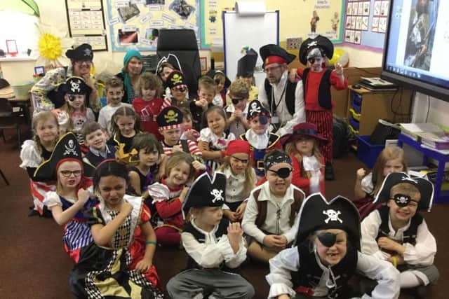 Year 1 teachers at the Richmond School in Skegness Mrs Kate Beaumont and Mrs Marie Lake with teacher Mr Gareth Mills dressed up as pirates for World Book Day. ANL-170203-221748001