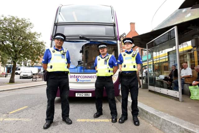 PCSO Nigel Wass (centre) with colleagues at the launch of the first BusBeat scheme in Horncastle.