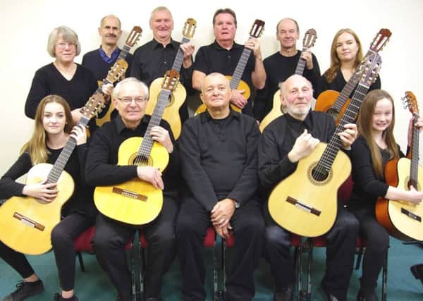 Members of The Solo Classical Guitar Ensemble of South Lincolnshire. EMN-170803-105834001