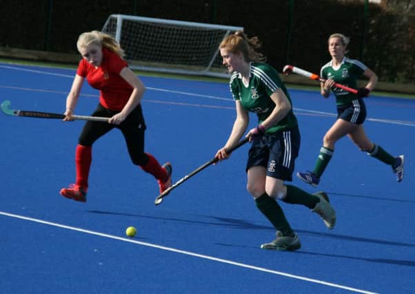 Lowis Haigh (left) and Alsha Hanson in green, in action for Brigg Ladies first team during their win over City of York.