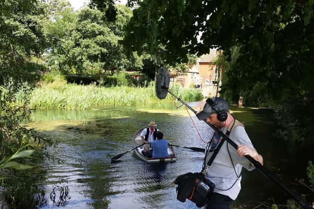 John Bangay filming in the borrowed rowing boat at Cogglesford Mill last year. EMN-170603-150254001