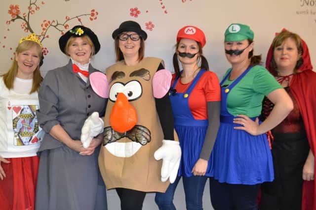 The catering team in costume. EMN-170603-182029001